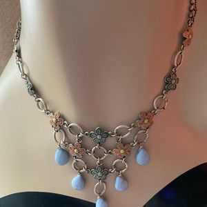 Flowers and nugget necklace.